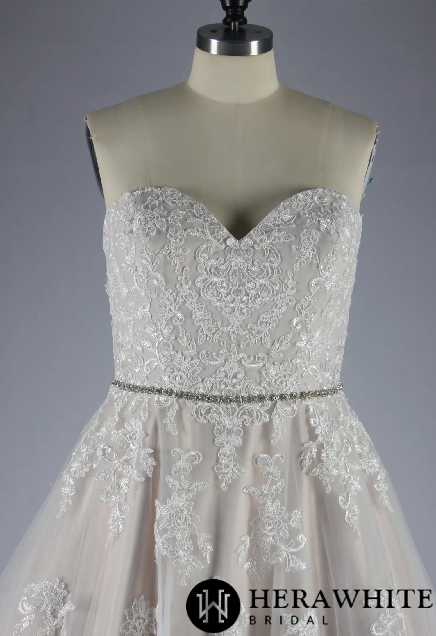 Blush Strapless Ball Gown Wedding Dress With Lace Motifs