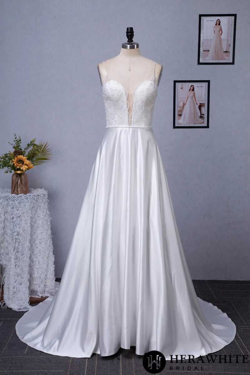 Beaded Deep V-neckline Satin A-Line Pockets Wedding Dress