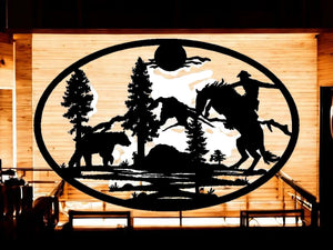 METAL cowboy on horse and bear oval scene