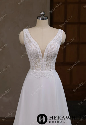 Deep V-neck and sleeveless design with symmetrical lace wedding gown HW3641