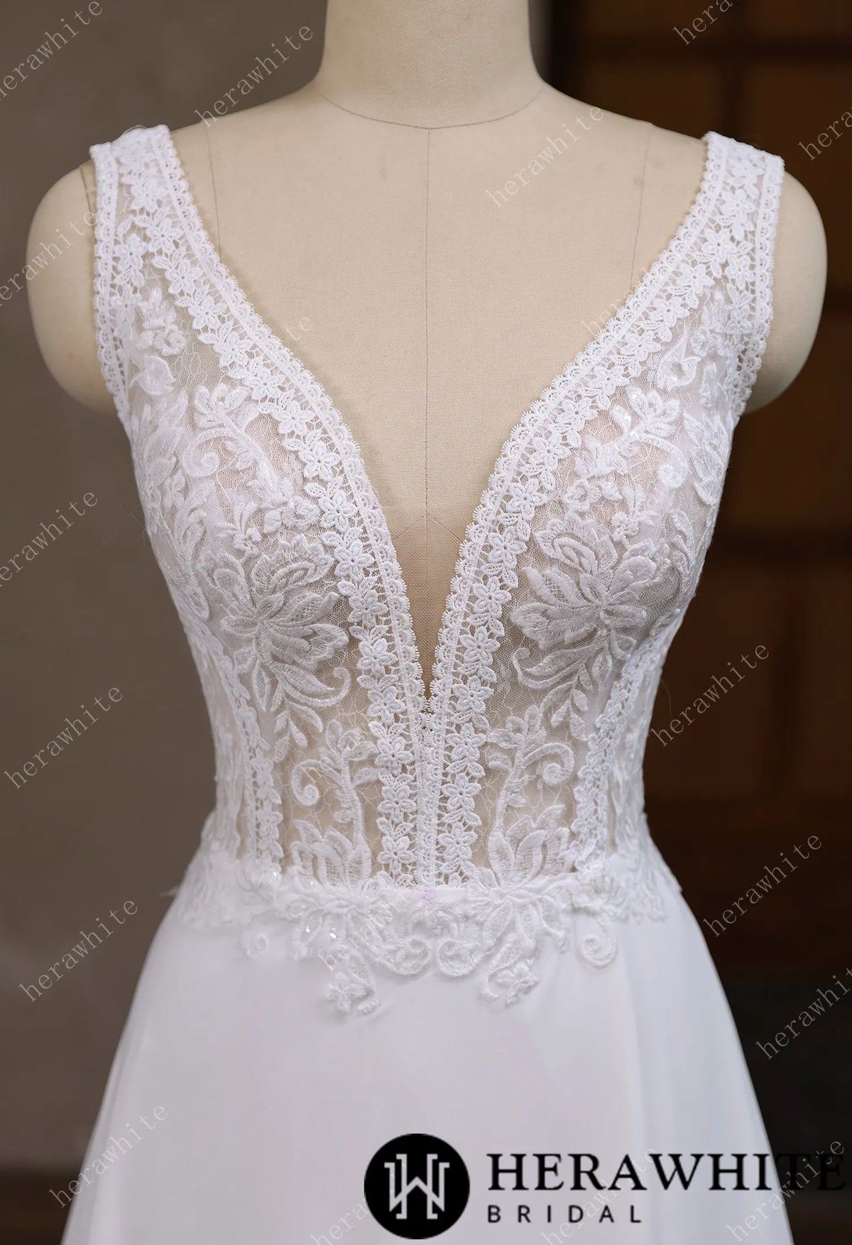 Deep V-neck and sleeveless design with symmetrical lace wedding gown HW3641