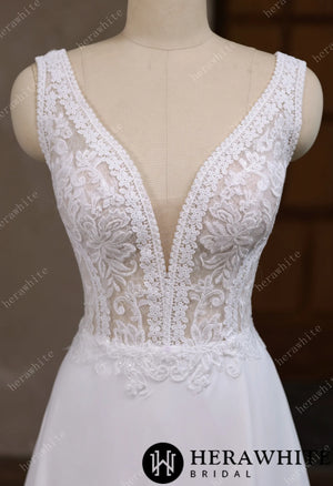 Deep V-neck and sleeveless design with symmetrical lace wedding gown HW3641