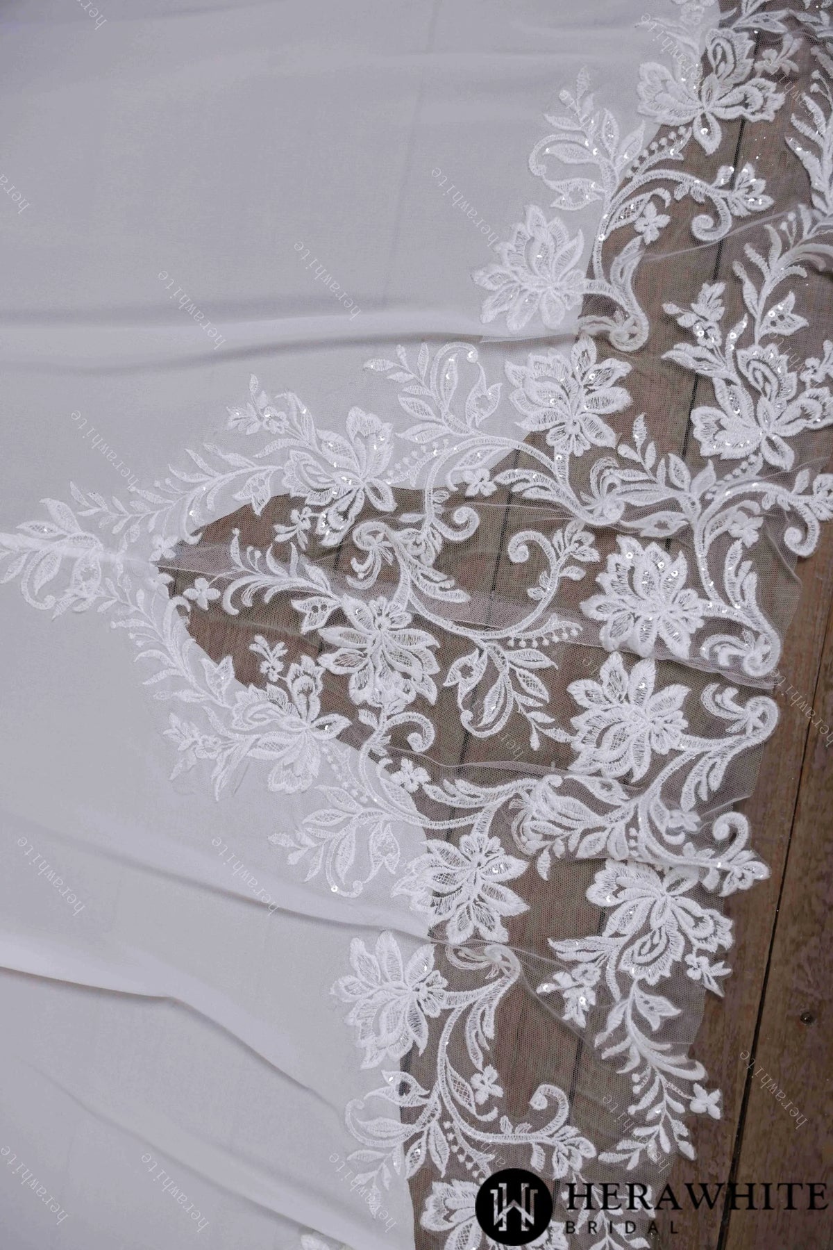 Deep V-neck and sleeveless design with symmetrical lace wedding gown HW3641