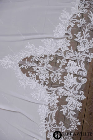 Deep V-neck and sleeveless design with symmetrical lace wedding gown HW3641
