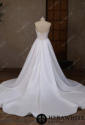 Irregular neckline with a Basque waistline wedding gown HW3796