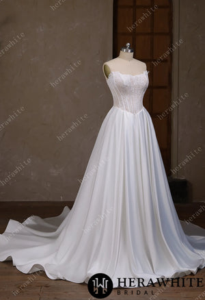 Irregular neckline with a Basque waistline wedding gown HW3796