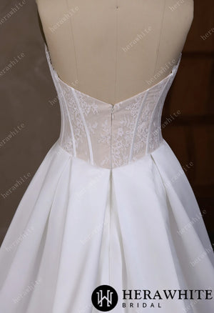 Irregular neckline with a Basque waistline wedding gown HW3796