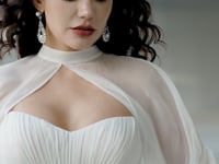 Elegant Strapless Pleated Wedding Dress with Lace Mermaid Skirt and Flowing Sheer Cape HW3580